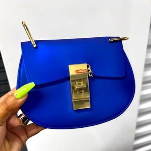 Women Royal blue handbag with long gold chain